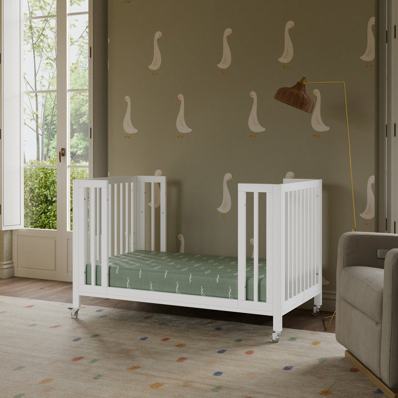 Load image into Gallery viewer, Babyletto Rolli 9-in-1 Convertible All-Stages Crib with Bassinet &amp; Toddler Bed Conversion Kits
