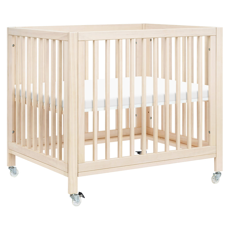 Load image into Gallery viewer, Babyletto Rolli 9-in-1 Convertible All-Stages Crib with Bassinet &amp; Toddler Bed Conversion Kits
