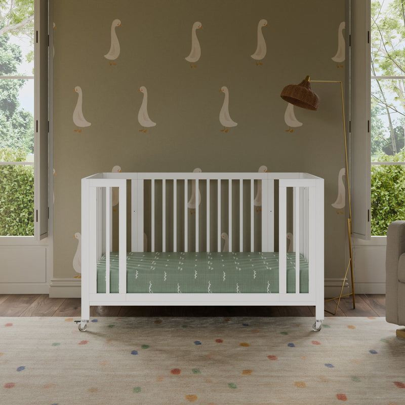 Load image into Gallery viewer, Babyletto Rolli 9-in-1 Convertible All-Stages Crib with Bassinet &amp; Toddler Bed Conversion Kits
