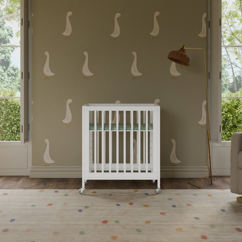 Load image into Gallery viewer, Babyletto Rolli 9-in-1 Convertible All-Stages Crib with Bassinet &amp; Toddler Bed Conversion Kits
