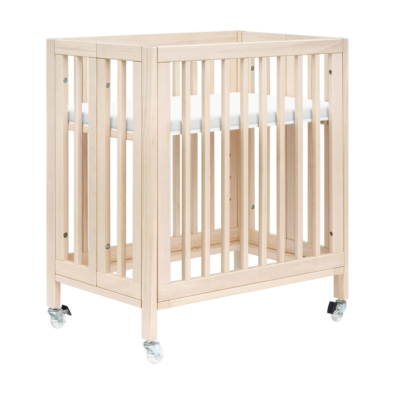 Load image into Gallery viewer, Babyletto Rolli 9-in-1 Convertible All-Stages Crib with Bassinet &amp; Toddler Bed Conversion Kits
