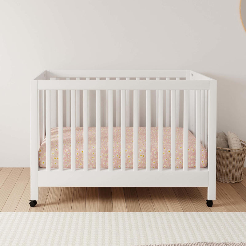 Load image into Gallery viewer, Babyletto Maki Portable Folding Crib with Toddler Bed Conversion Kit
