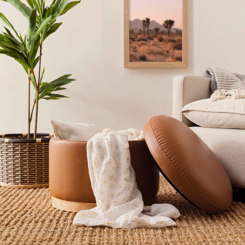 Load image into Gallery viewer, Babyletto Naka Storage Ottoman in Vegan Leather
