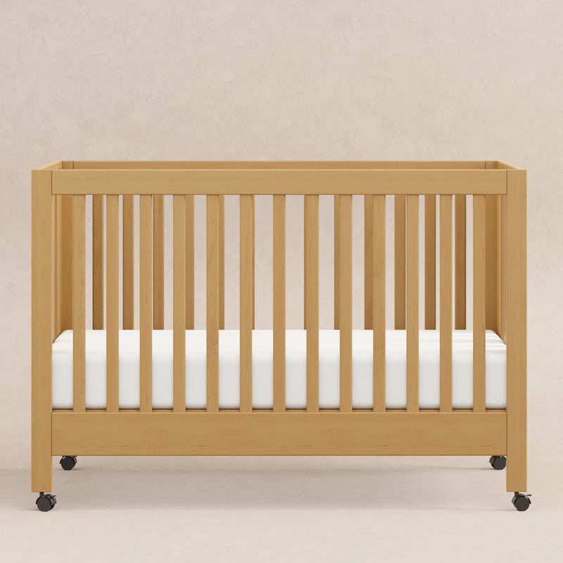 Load image into Gallery viewer, Babyletto Maki Portable Folding Crib with Toddler Bed Conversion Kit
