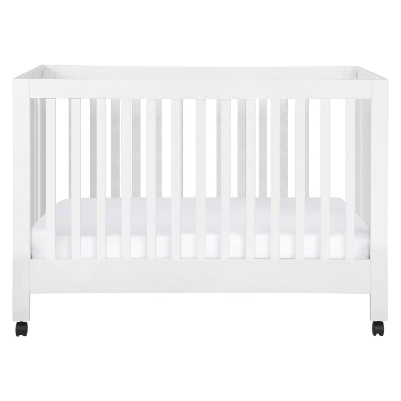 Load image into Gallery viewer, Babyletto Maki Portable Folding Crib with Toddler Bed Conversion Kit

