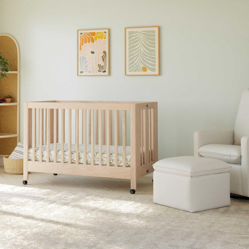 Load image into Gallery viewer, Babyletto Maki Portable Folding Crib with Toddler Bed Conversion Kit
