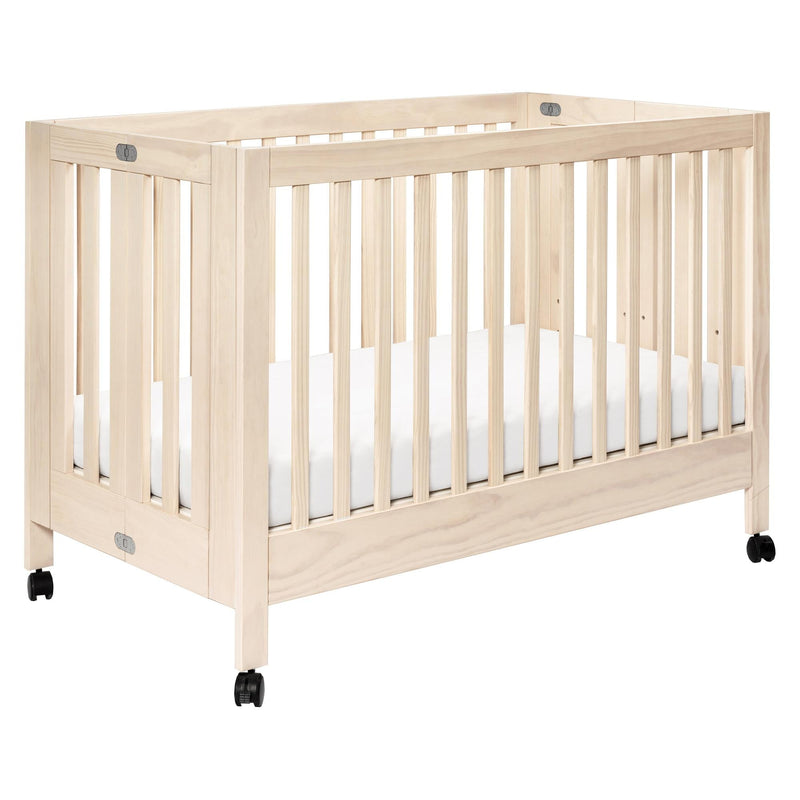 Load image into Gallery viewer, Babyletto Maki Portable Folding Crib with Toddler Bed Conversion Kit
