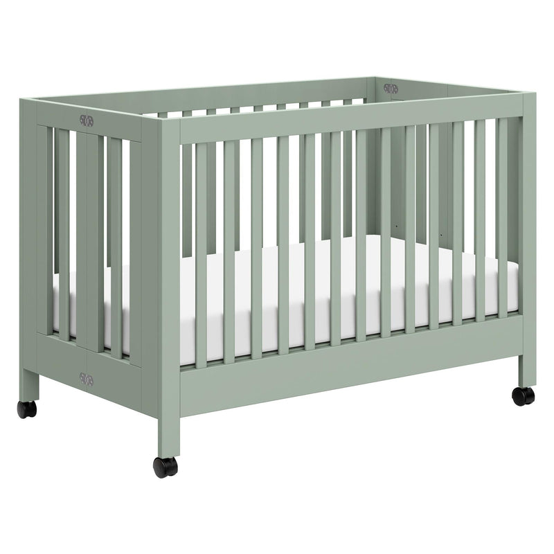 Load image into Gallery viewer, Babyletto Maki Portable Folding Crib with Toddler Bed Conversion Kit
