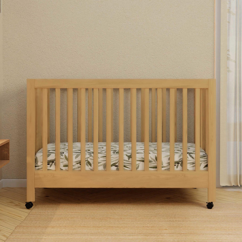 Load image into Gallery viewer, Babyletto Maki Portable Folding Crib with Toddler Bed Conversion Kit
