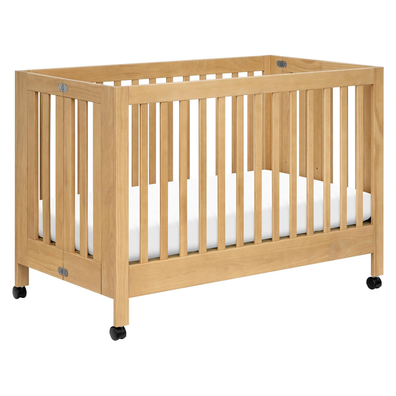 Load image into Gallery viewer, Babyletto Maki Portable Folding Crib with Toddler Bed Conversion Kit

