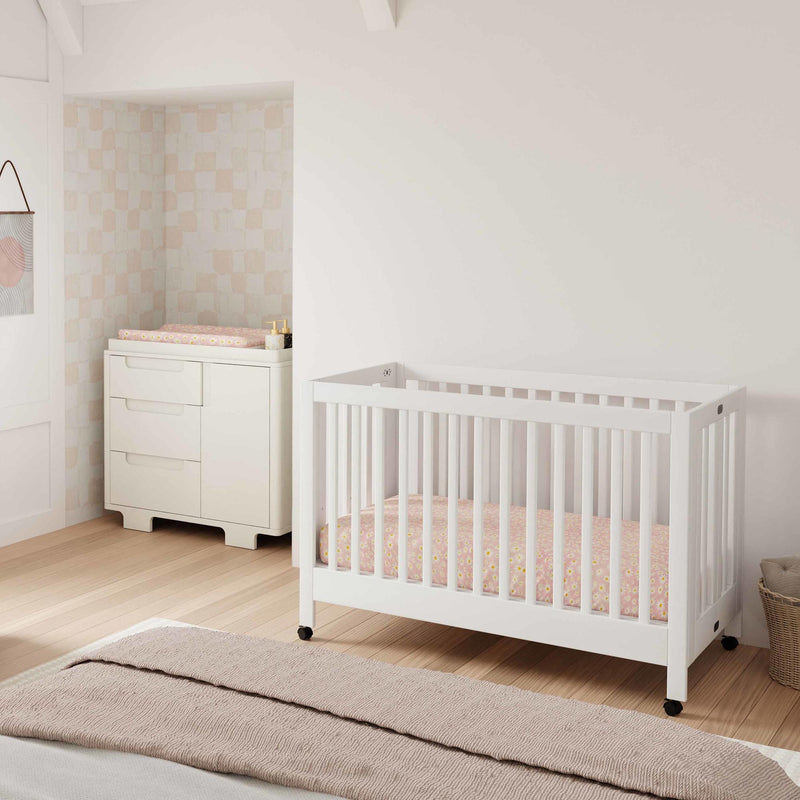 Load image into Gallery viewer, Babyletto Maki Portable Folding Crib with Toddler Bed Conversion Kit
