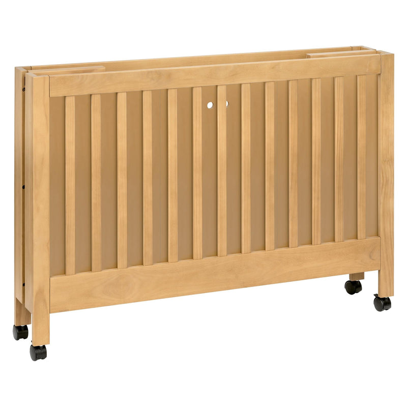 Load image into Gallery viewer, Babyletto Maki Portable Folding Crib with Toddler Bed Conversion Kit

