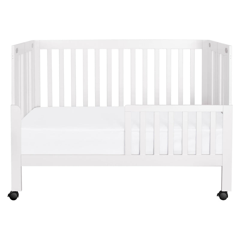Load image into Gallery viewer, Babyletto Maki Portable Folding Crib with Toddler Bed Conversion Kit
