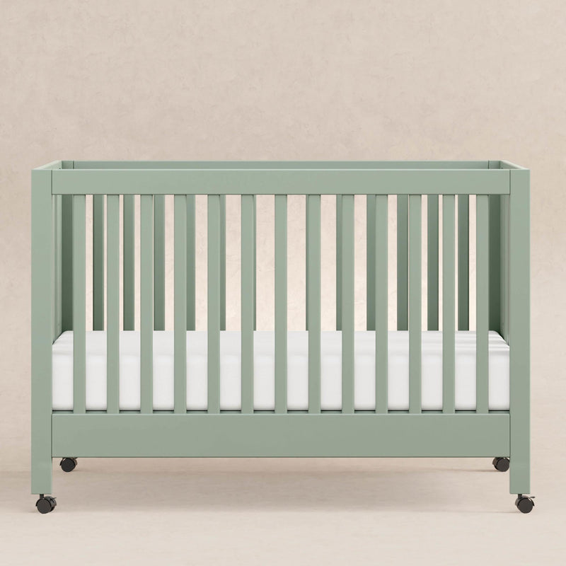 Load image into Gallery viewer, Babyletto Maki Portable Folding Crib with Toddler Bed Conversion Kit
