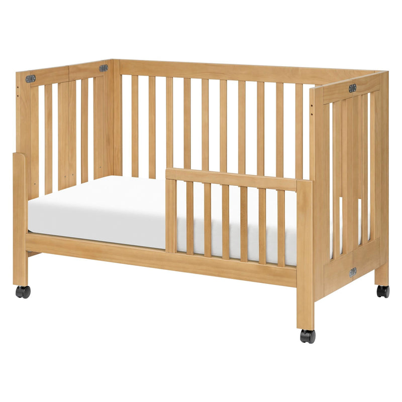 Load image into Gallery viewer, Babyletto Maki Portable Folding Crib with Toddler Bed Conversion Kit
