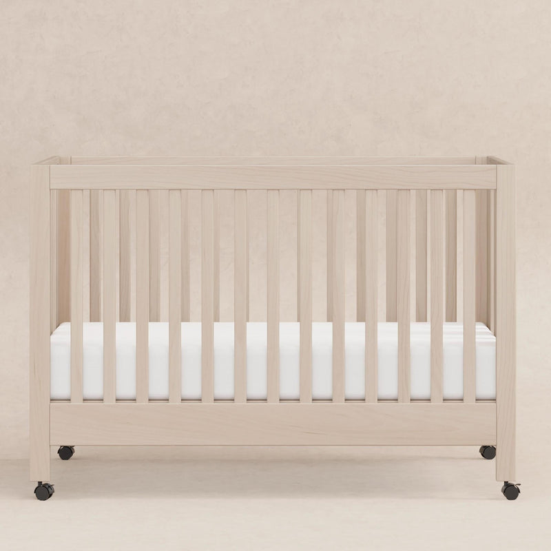 Load image into Gallery viewer, Babyletto Maki Portable Folding Crib with Toddler Bed Conversion Kit
