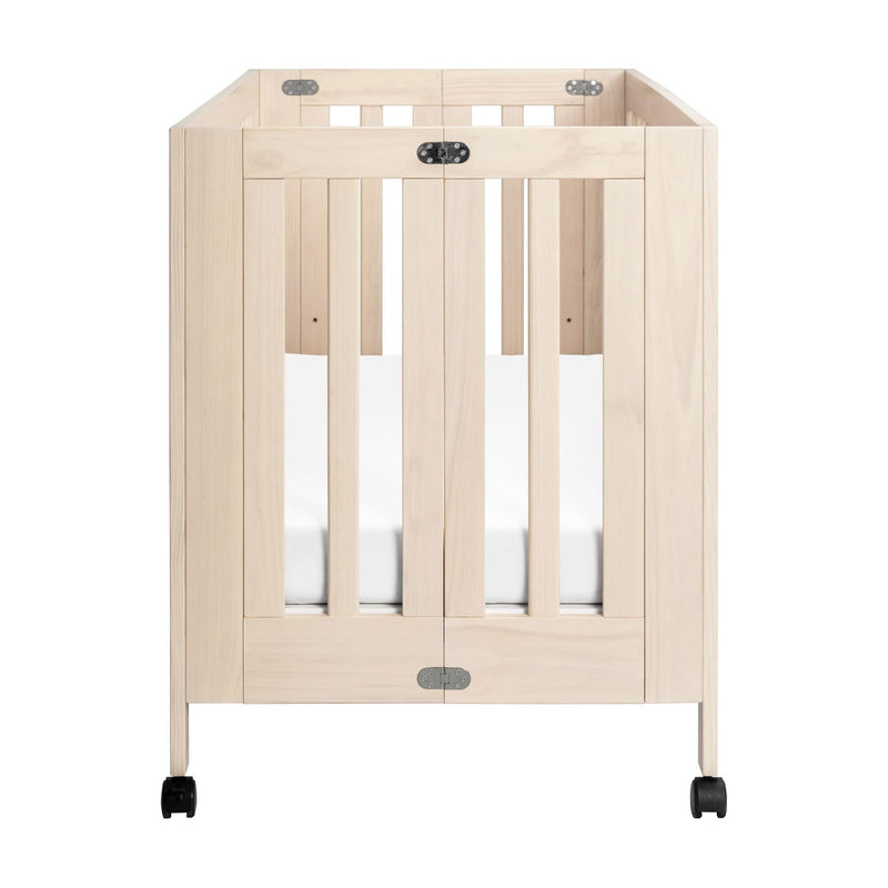 Load image into Gallery viewer, Babyletto Maki Portable Folding Crib with Toddler Bed Conversion Kit
