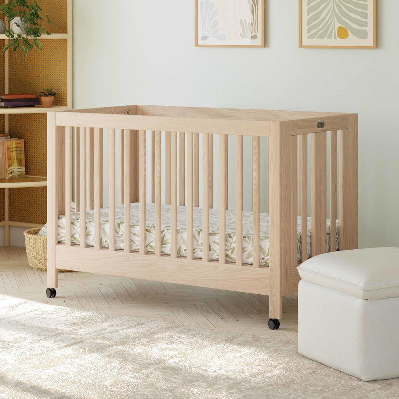 Load image into Gallery viewer, Babyletto Maki Portable Folding Crib with Toddler Bed Conversion Kit

