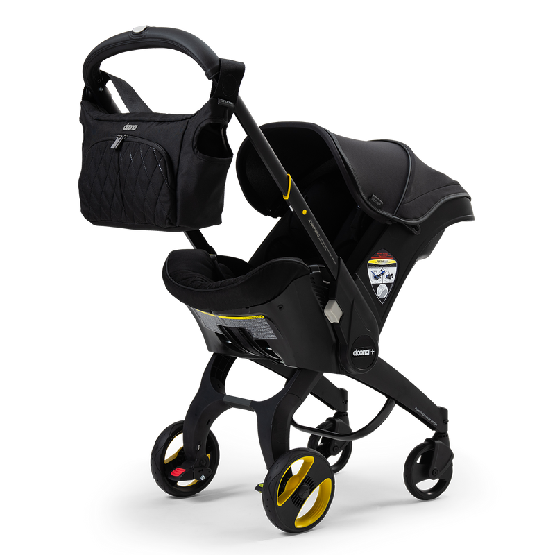 Load image into Gallery viewer, Doona Infant Car Seat + Base + Essentials Bag | Midnight Edition
