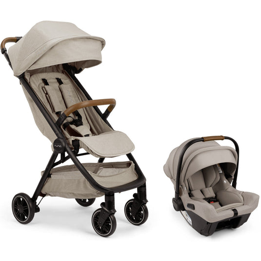 Tan Nuna TRVL Stroller with Pipa URBN car seat that attaches, foldable for storage,